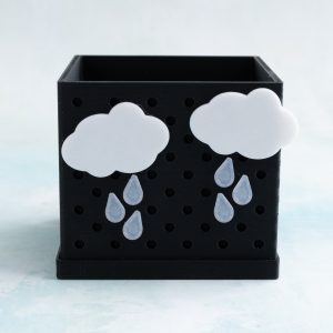 rain clouds and raindrop snaps on black pot