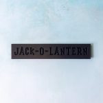 jack o lantern plaque snap black front