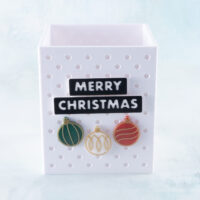 Merry christmas ornaments charm set on white pen holder