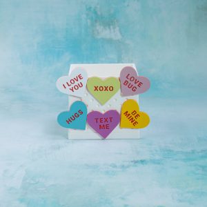 multicolor conversation heart snaps on 3 inch white snappy pot