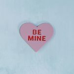 red on pink be mine conversation heart