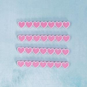 white on pink heart border snaps front