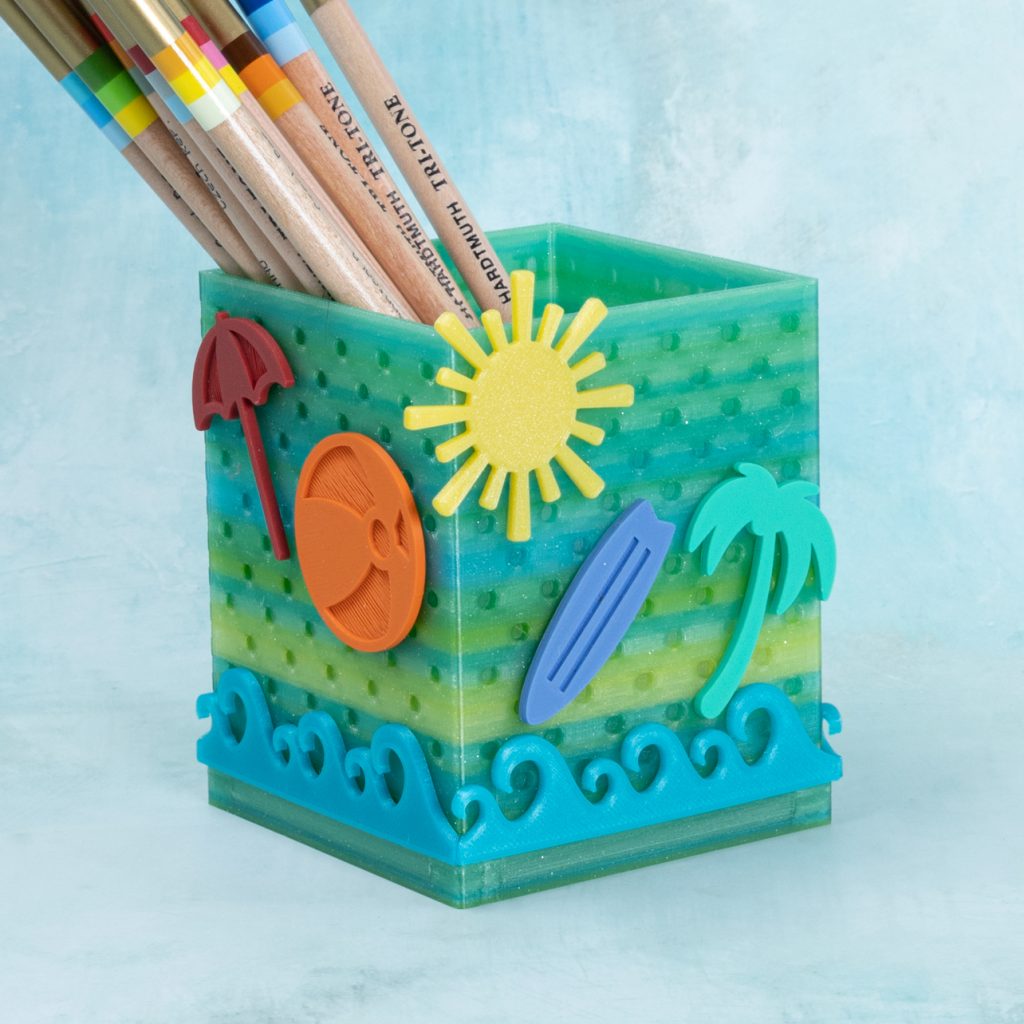 fantasy forest snappy box with pencils and beach shapes