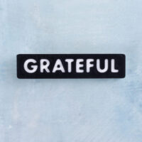 Black and white word charm grateful