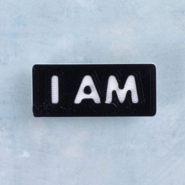 Black and white word charm i am