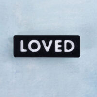 Black and white word charm loved