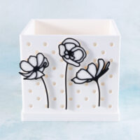 Line flowers charms on white snappy planter