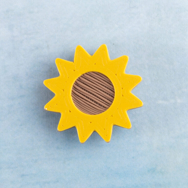 Sunflower charm front