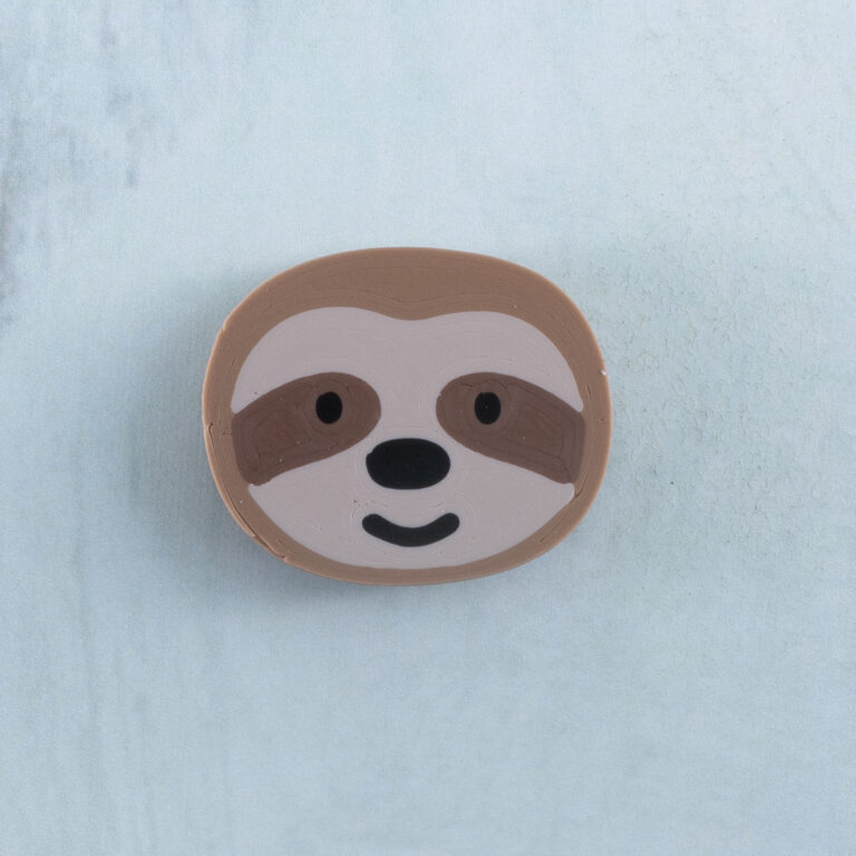 Brown sloth charm