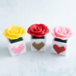 yellow red pink rose snappy pots clicker fidgets with simple heart snaps angle