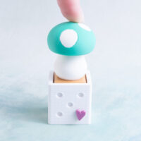 green mushroom clicker fidgets snappy pots pressed down