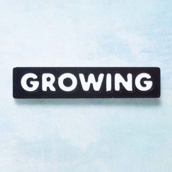 Growing word charms snappy pots