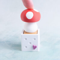 red mushroom clicker fidgets snappy pots pressed down