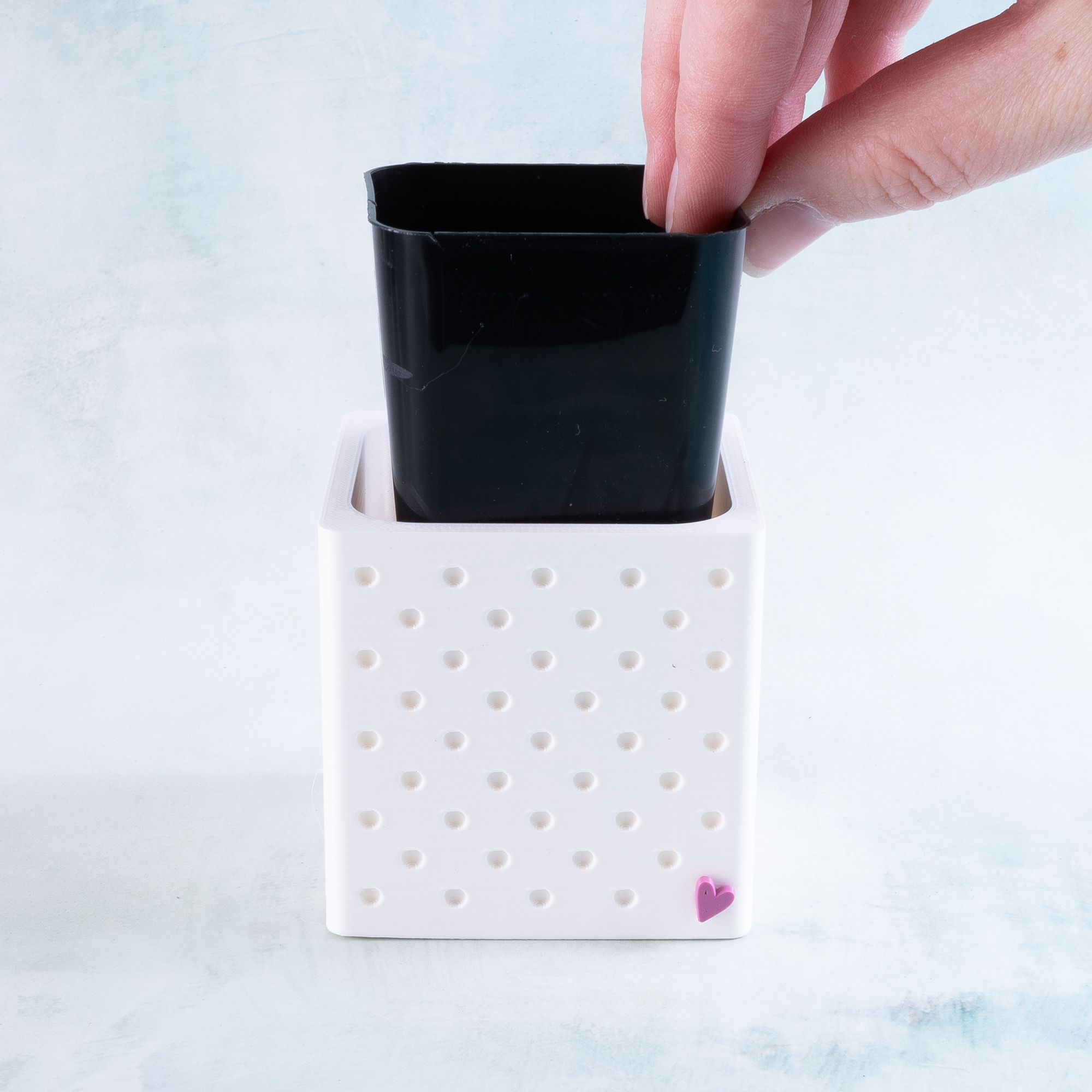 snappy pot nursery cover 2-inch with liner partially out