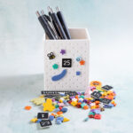 assorted snappy pots charms on pen holder