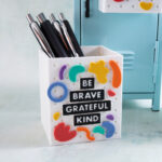 rainbow squiggle shapes on pen holder be brave grateful kind