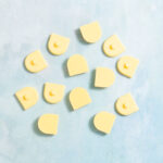 Banana yellow scallop charms from Snappy Pots