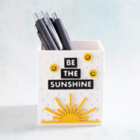 Snappy Pots pen holder with smiley face charms and be the sunshine word charms