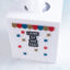 snappy pots word charms land of the free on tissue box cover gold red blue scallops stars angle