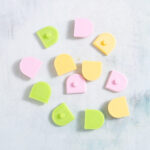Summer combo scallop charms in pastel pink, lime green, and banana yellow from Snappy Pots