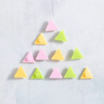 Summer combo triangle charms in pastel pink, lime green, and banana yellow from Snappy Pots