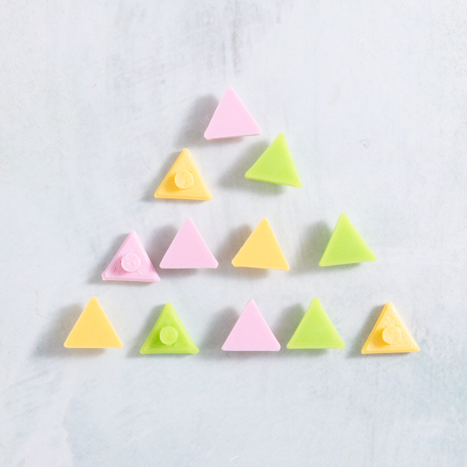 Summer combo triangle charms in pastel pink, lime green, and banana yellow from Snappy Pots