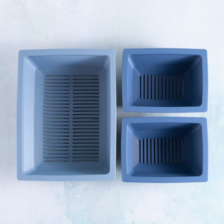 The large rectangle 3D printed planter beside two small rectangle planters, showing the size difference